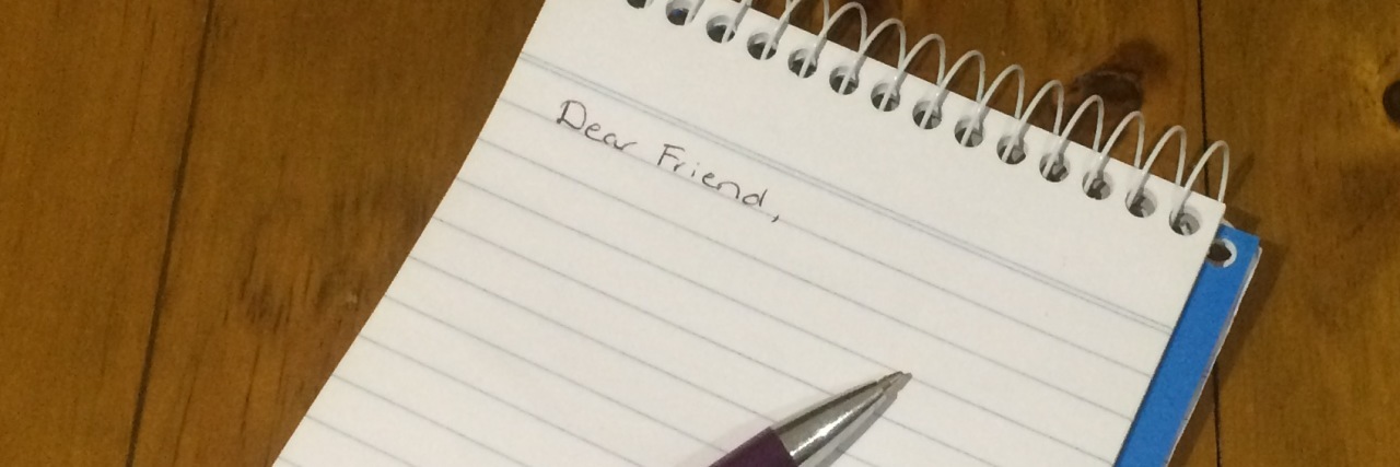 Note pad with the words, "dear friend"