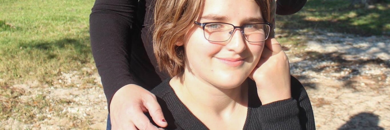 Letter to Daughter With Same Mental Health Struggles photo of woman and daughter sitting in sunlight and smiling