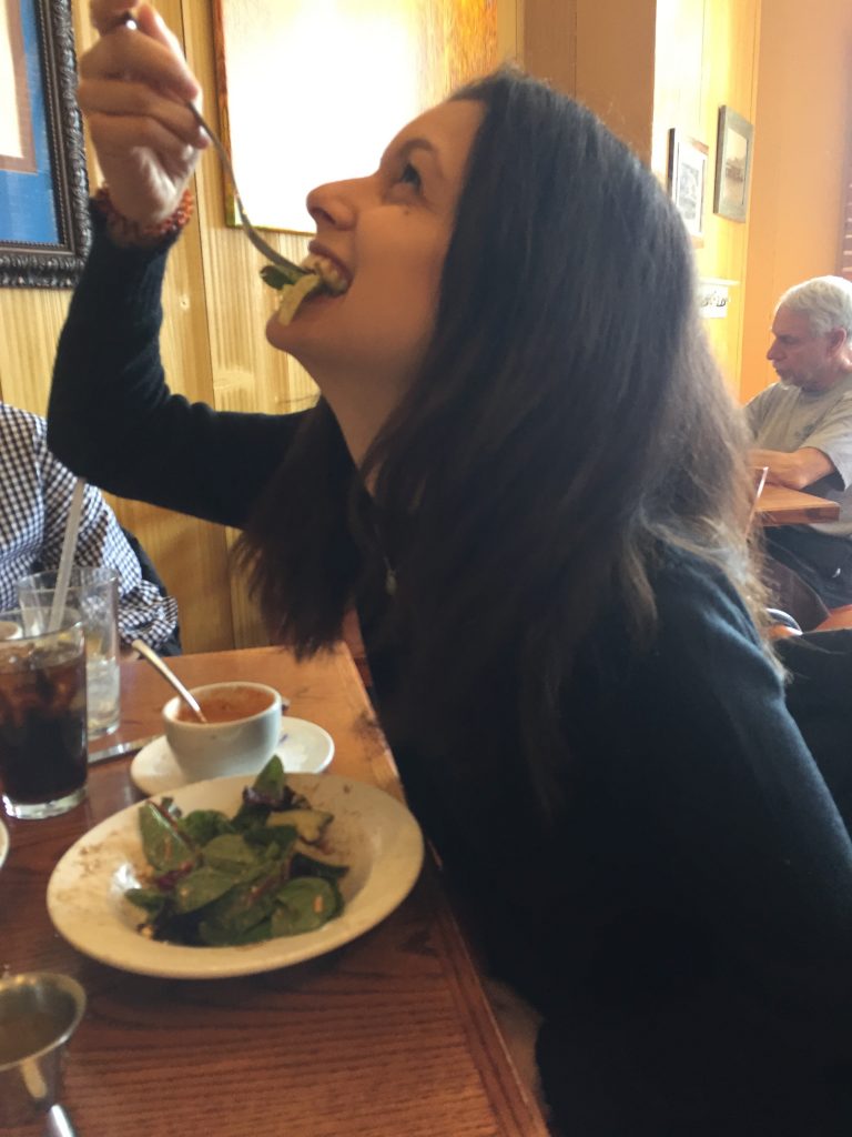 woman eating a salad