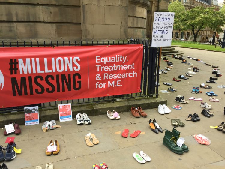 shoes and signs from millions missing event in birmingham, england