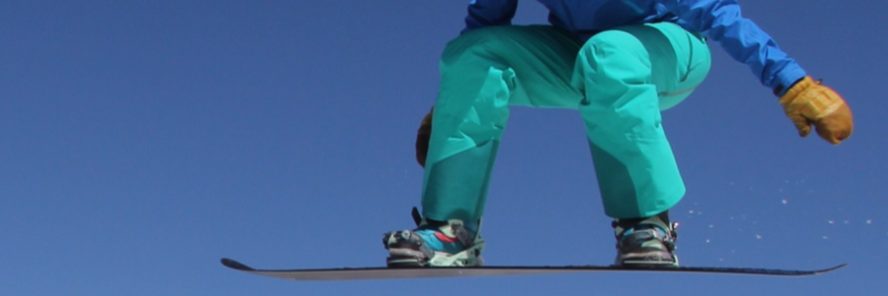 Bibian Mentel: What the Olympics Taught Me About Cancer Paralympic athlete Bibian Mentel in mid-air on her snowboard.