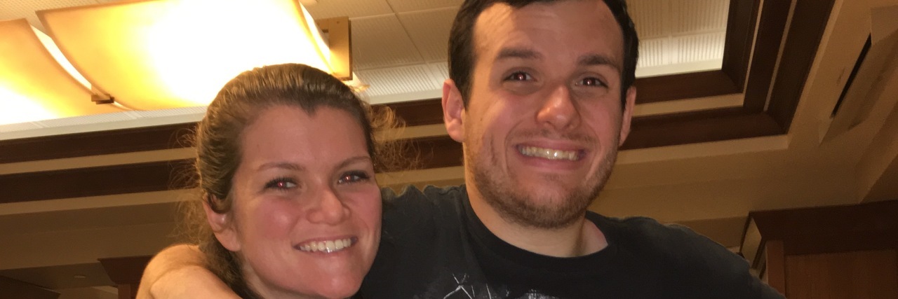 How My Brother's Autism Helped Me As a Professional Adult siblings hugging and smiling at camera.