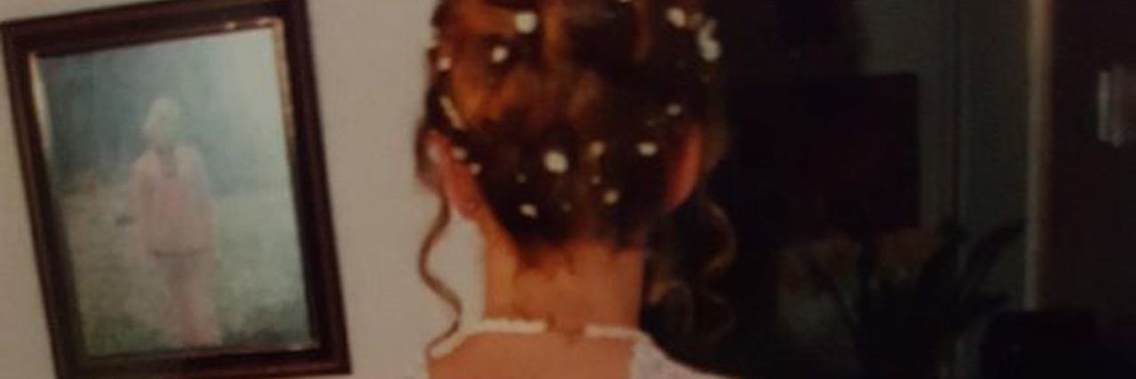The 5 Steps I Took to Love My Body With Scoliosis A picture of the writer in her white debutante dress in the 90s.