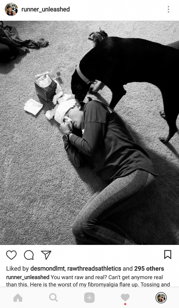black and white photo of the author lying on the floor with a migraine