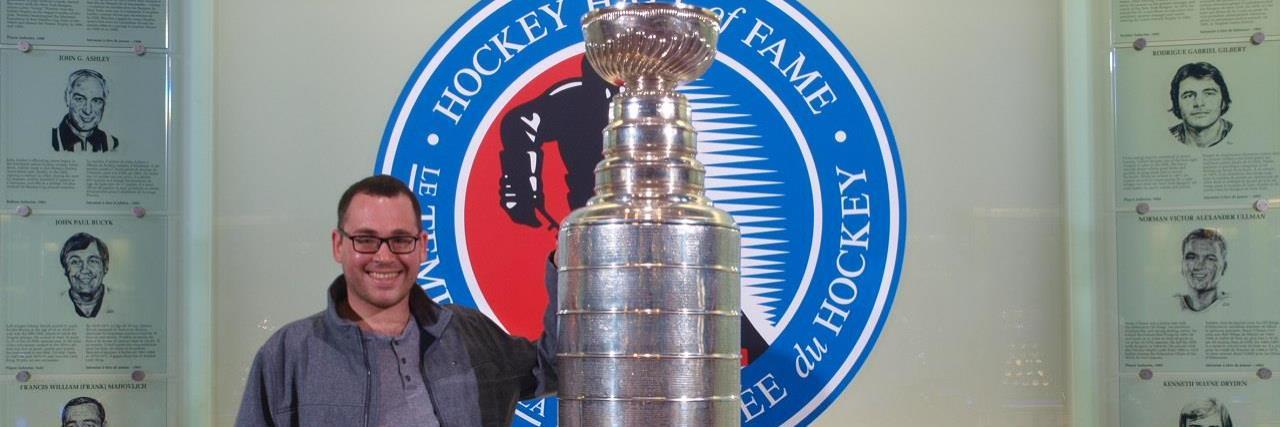 My Solo Trip to Canada as an American With Autism Louis Scarantino visiting the Hockey Museum.