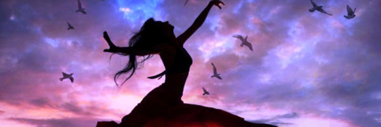 Learning to Be Independent Again After Lyme Disease silhouette of a woman leaping with birds and a sunset in the background