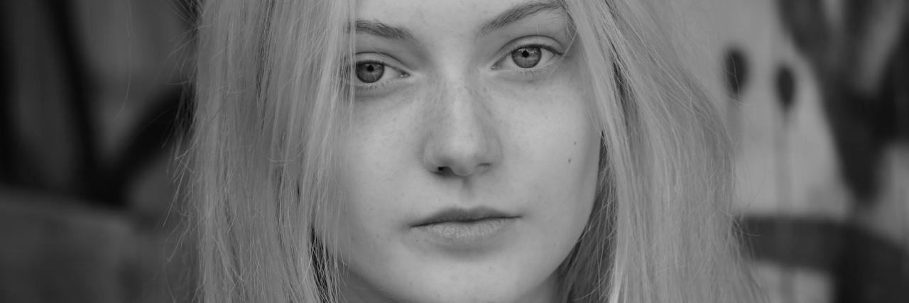 When People Think You Are 'Too Pretty' to Be Suicidal woman sad