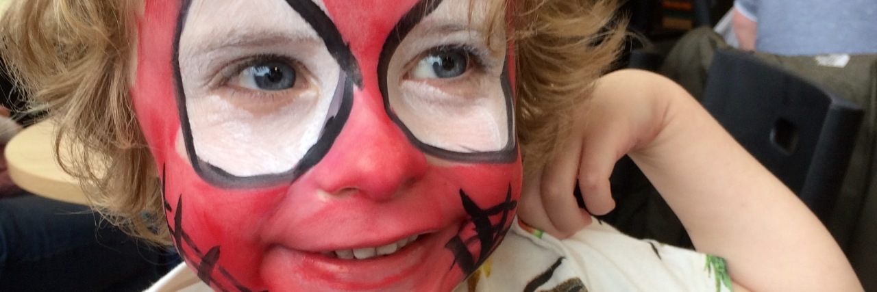 Attending a Kids' Party as a Mother With Asperger's Syndrome Kay's son in Spider-Man face paint.