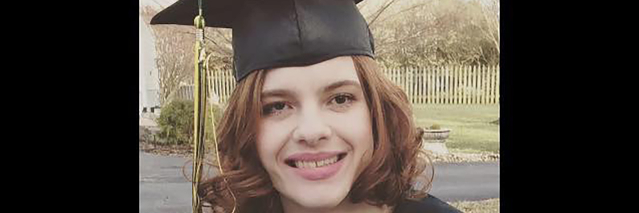 Wheelchairs and Disabilities Don't Determine Intelligence Alyssa Brown in her graduation cap and gown.
