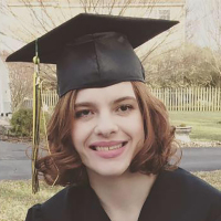 Alyssa Brown in her graduation cap and gown.