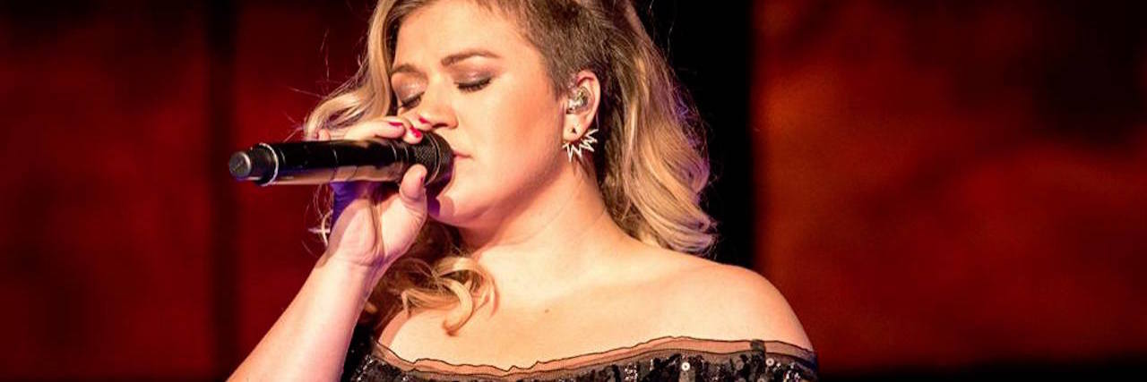 How Kelly Clarkson's Song 'Dark Side' Relates to People With Illnesses Kelly Clarkson