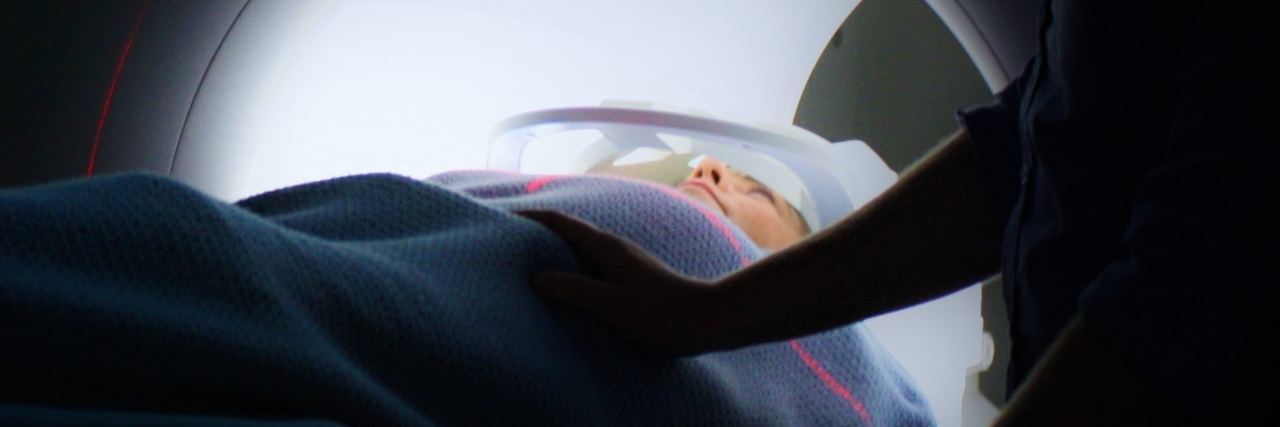 Urgent ER Trip Shows the Stigma Toward Mental Health Over Physical photo of person having CT scan