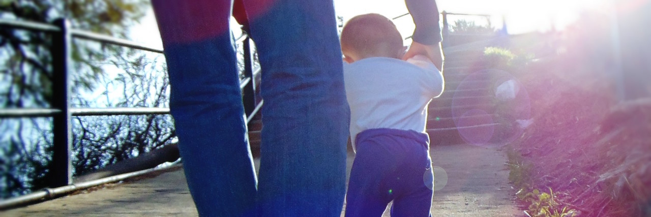 Letter to Daughter With Erythromelalgia the author's daughter walking with her father