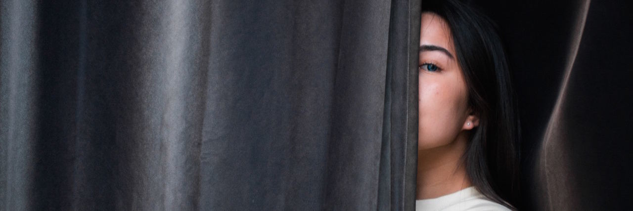 When Depression Makes You Feel 'Invisible' woman hiding