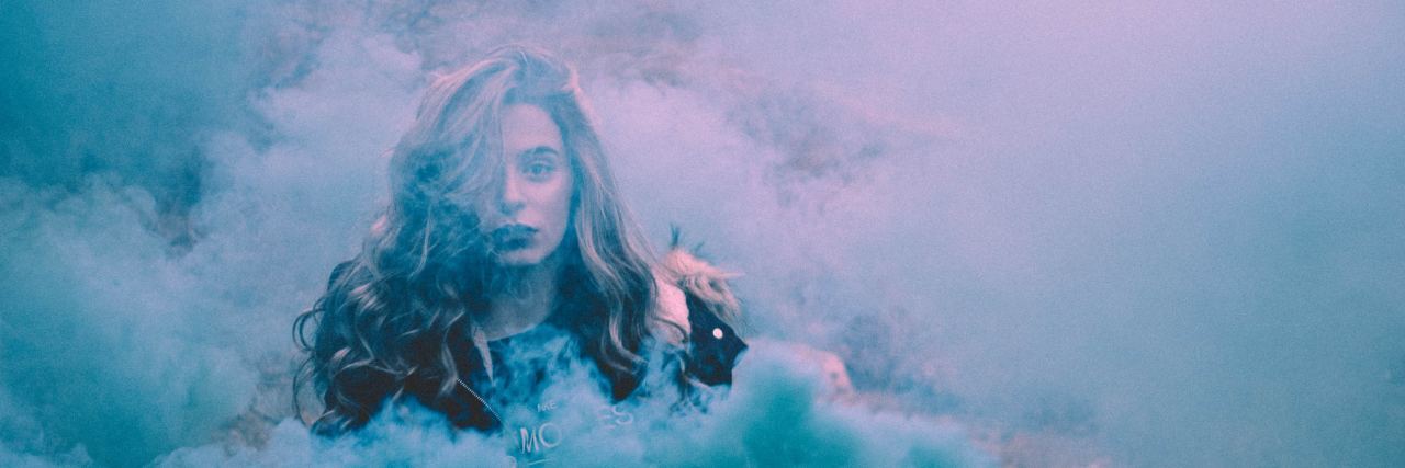 How I Found My Way Out of Depression woman surrounded by blue smoke