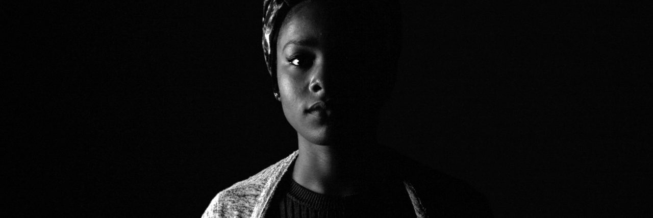Black Women (and Men) Can Be Suicidal, Too black and white photo of black woman looking at camera