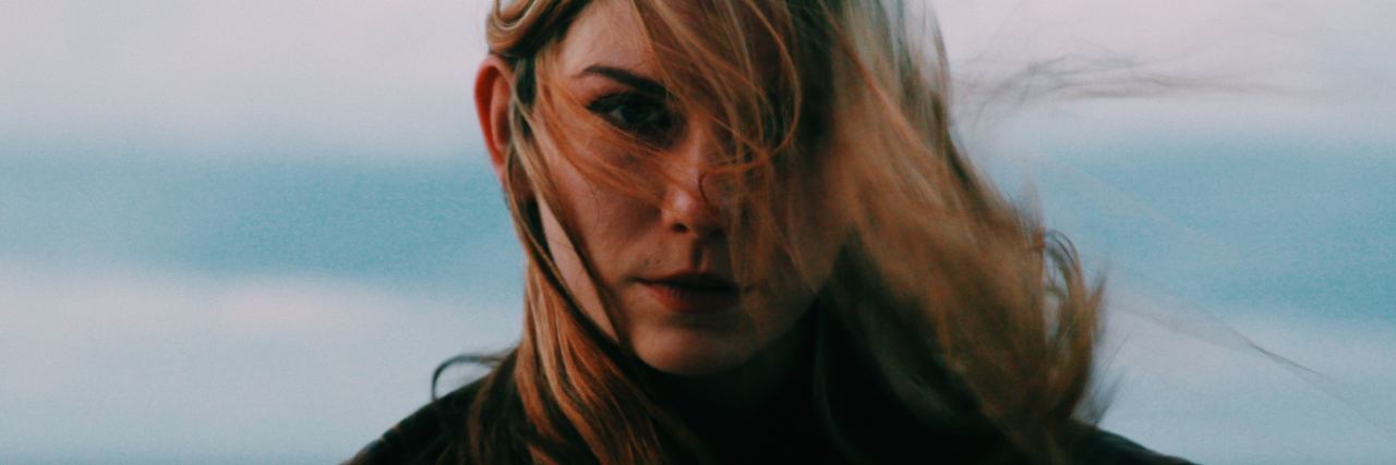 woman with hair flowing in the wind