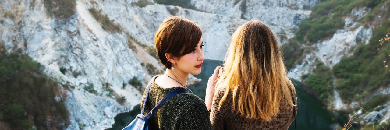 18 Things I Want My Friends to Know About My Anxiety two woman who are friends standing on top of a scenic area