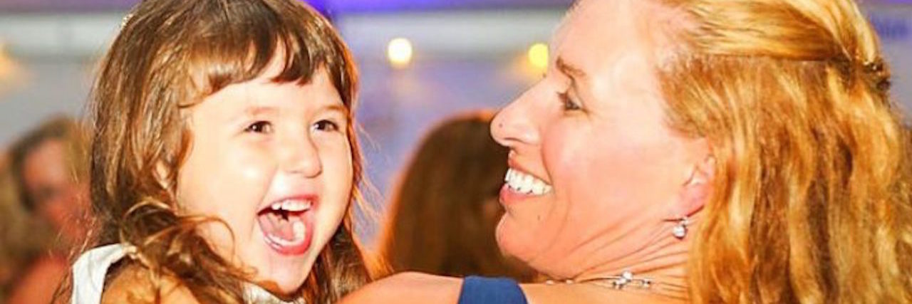 Parenting a Child With Spastic Parapalegia-47 the author and her child dancing and laughing