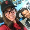 The author with a copy of GQ with Ryan Reynolds on the cover