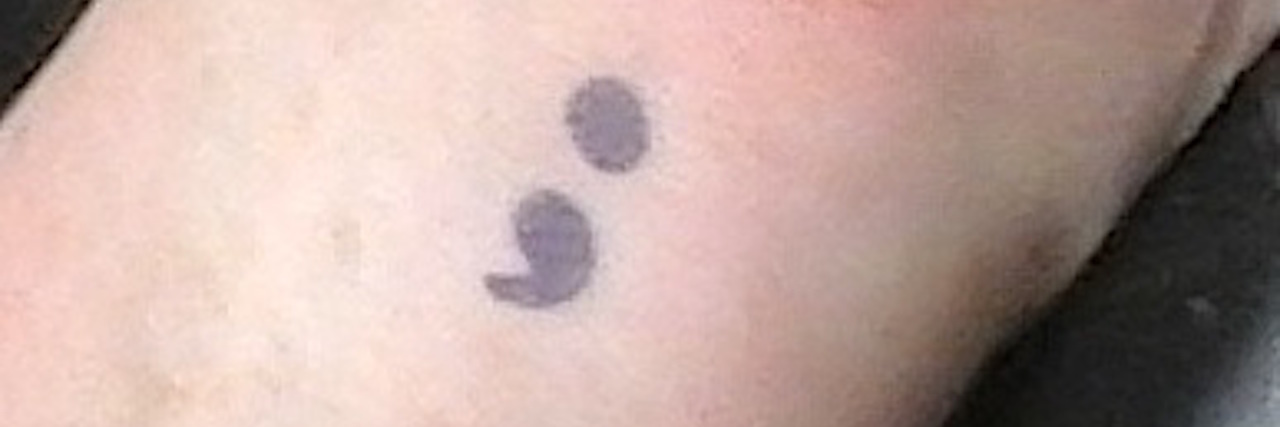 How My Tattoos Help Me When I'm Struggling With Bad Thoughts tattoo of semicolon on woman's wrist