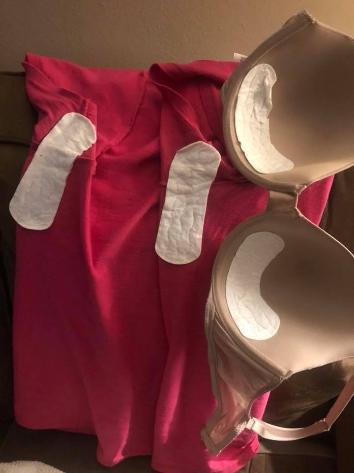sweat pads in woman's bra and clothes