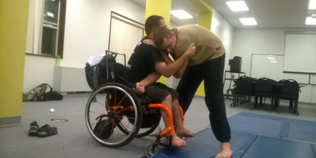 Learning Self-Defense and Self-Protection When You Have a Disability Brandon practicing jiu jitsu.