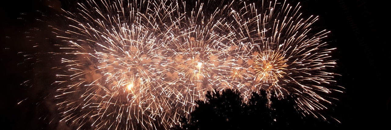 Why MS Makes Me Thankful for People Who Post Photos of Fireworks A photo of fireworks lighting up the night sky.