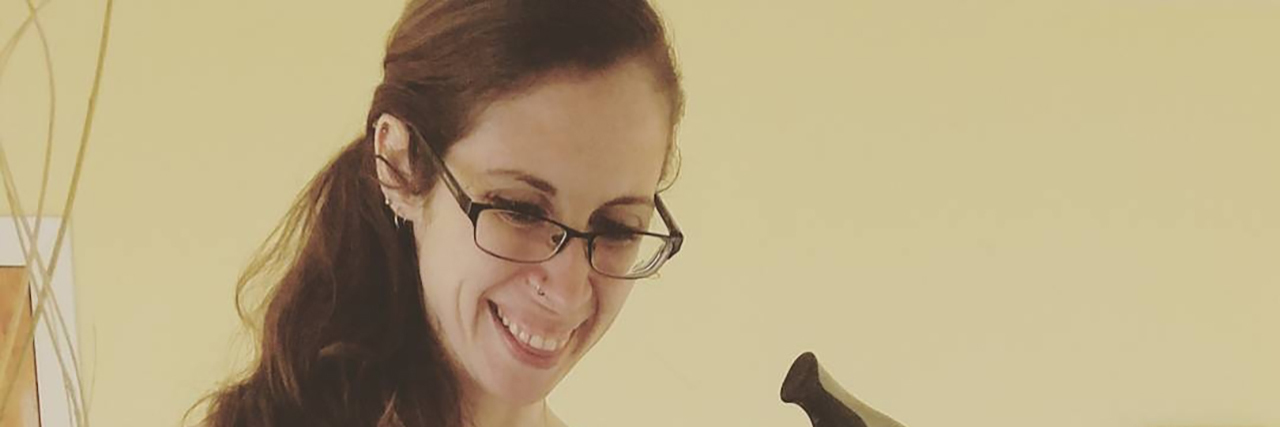 Why I'm an Activist for Disability Rights Farrah Kaeser posing for a selfie holding her cane.
