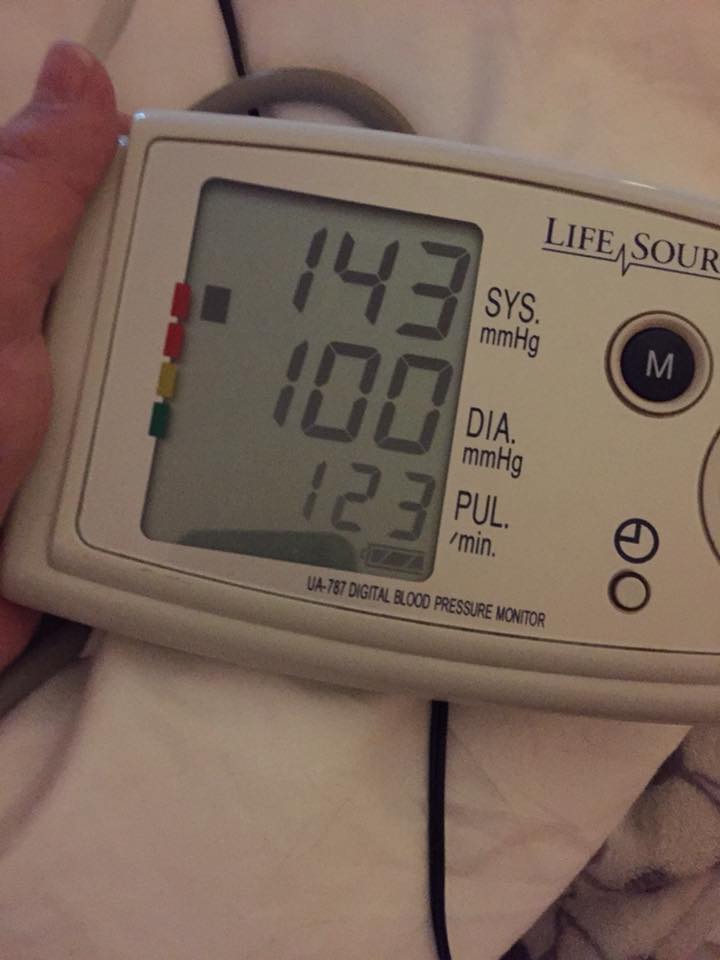 blood pressure monitor that reads 143 over 100