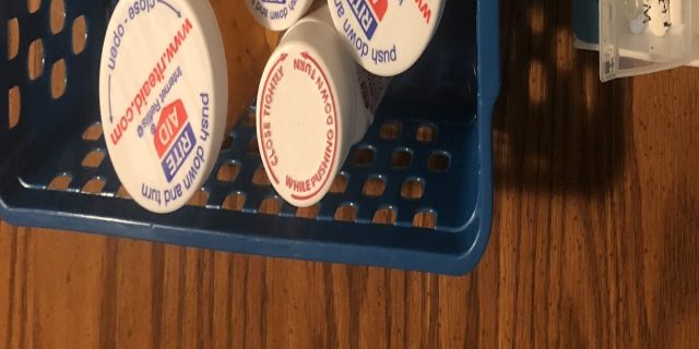 Why I Fear Losing Insurance as Someone With Pre-existing Conditions Lesley's containers of medications.