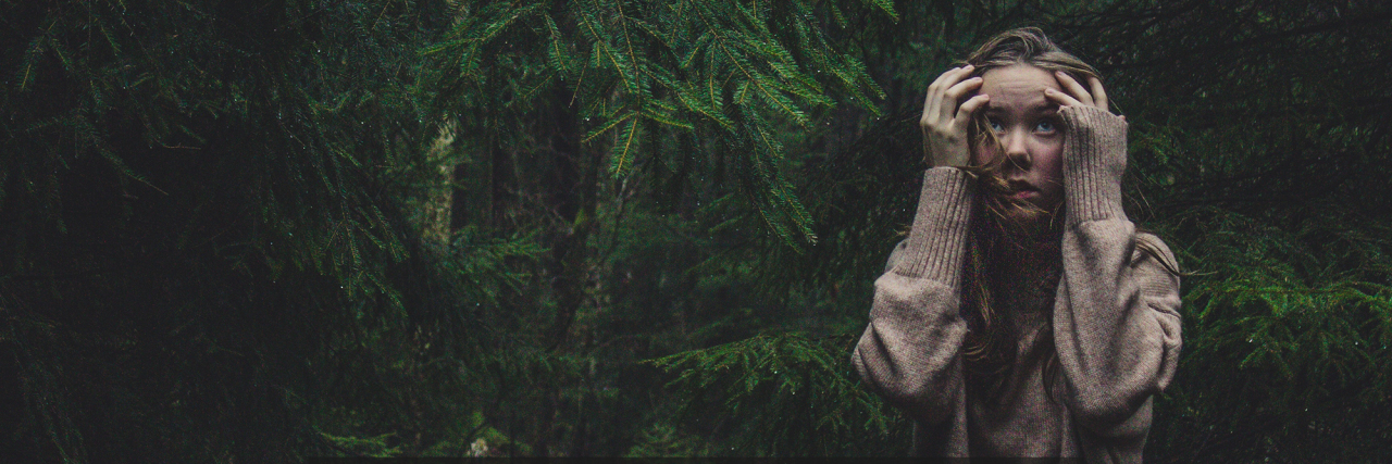 16 Problems Only People With Anxiety Understand A woman in the woods. Text reads: 16 problems only people with anxiety understand