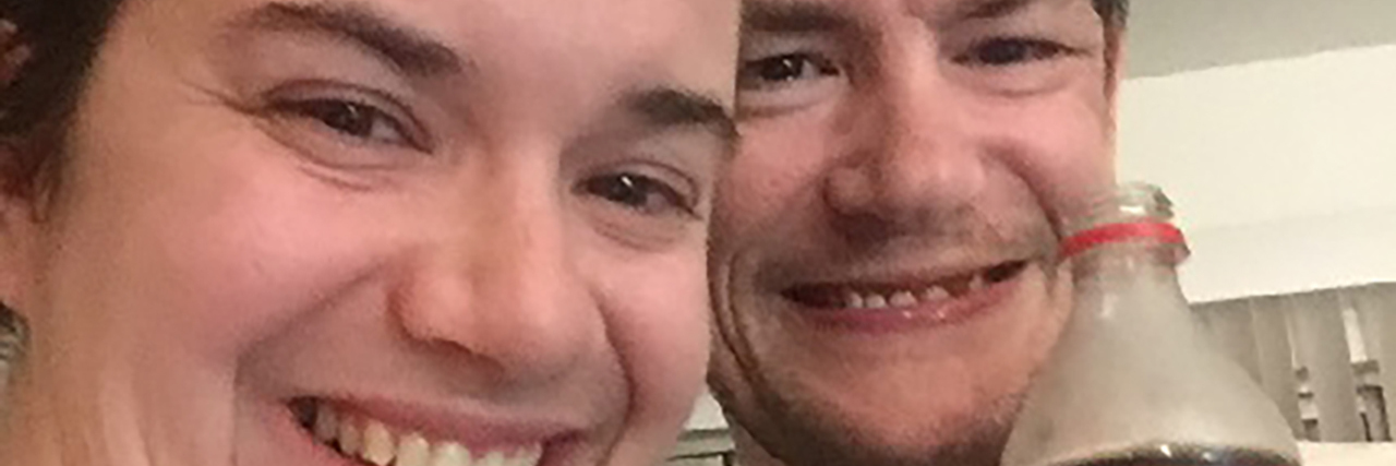 Why Advocacy Is Important to Us as a Couple With Disabilities Daniel and Leah holding personalized Coke bottles.