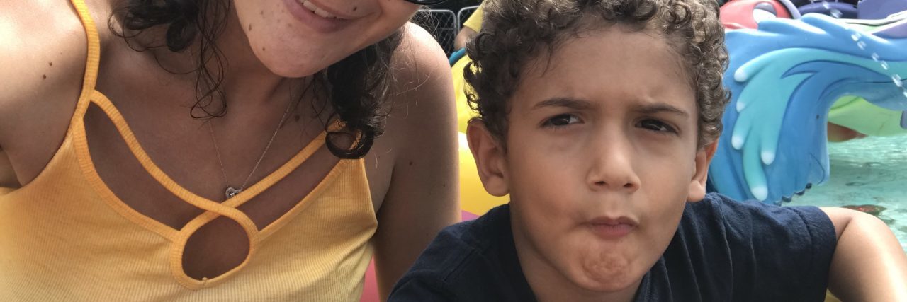 Mother and son at an amusement park