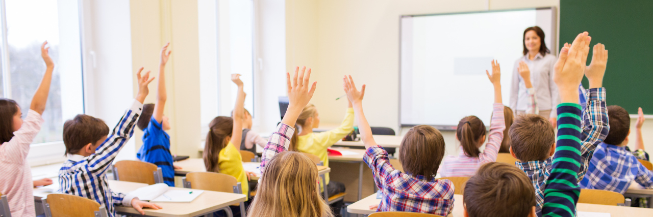 My Life as an Educator With Hidden ADD Teacher in classroom with students.