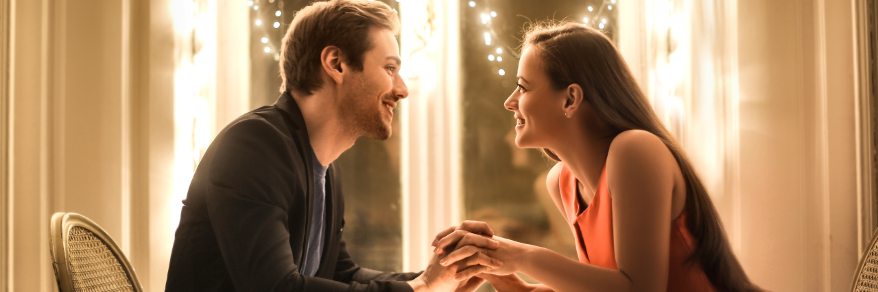 Dating, Drinking and Disability Couple having a romantic dinner.
