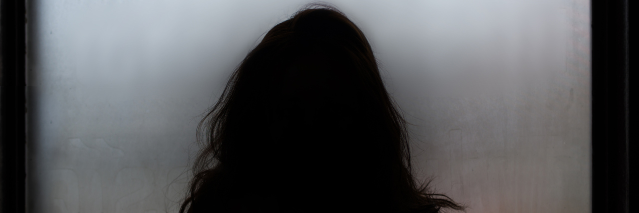 How My Disease Management Includes Me Addressing My Fears A silhouette of a woman.