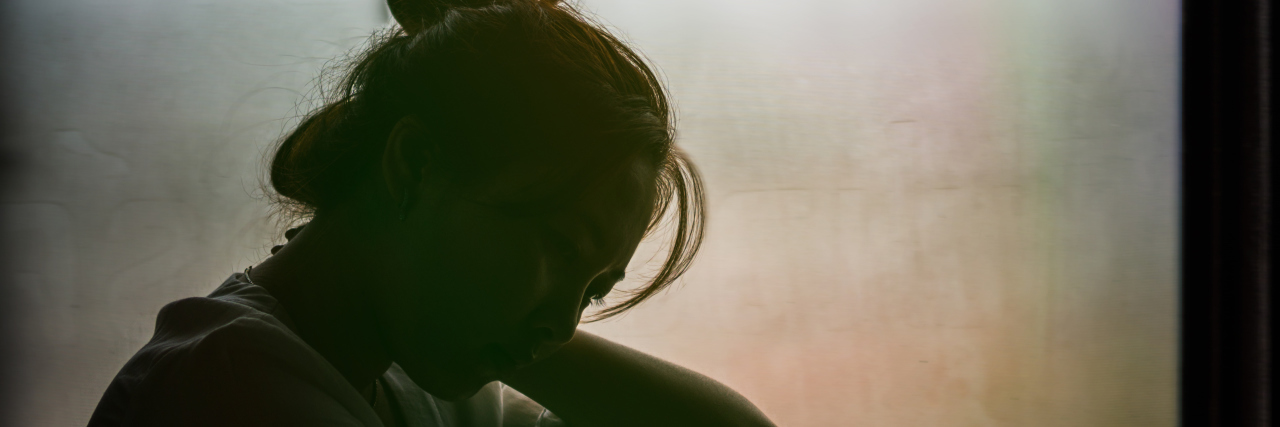 It's OK to Struggle With Your Disability Sometimes Silhouette of depressed woman.