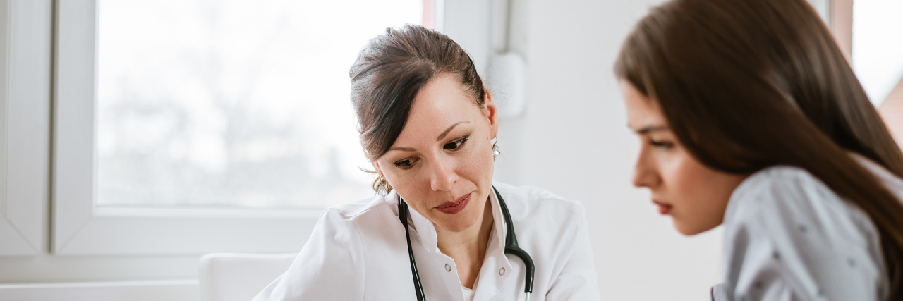5 Ways Doctors Can Better Support Their Patients With Crohn's Disease A doctor talking to her patient.