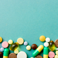 Various pills on a blue background