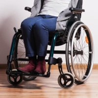 Woman in wheelchair.