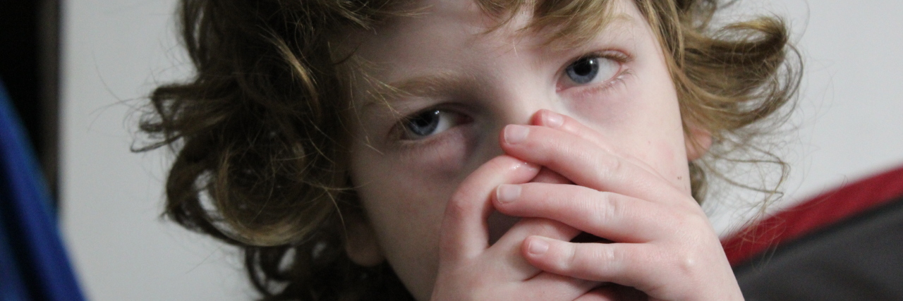 How Having a Brother With a Disability Changed My Life Over the Years author's brother looking into the camera