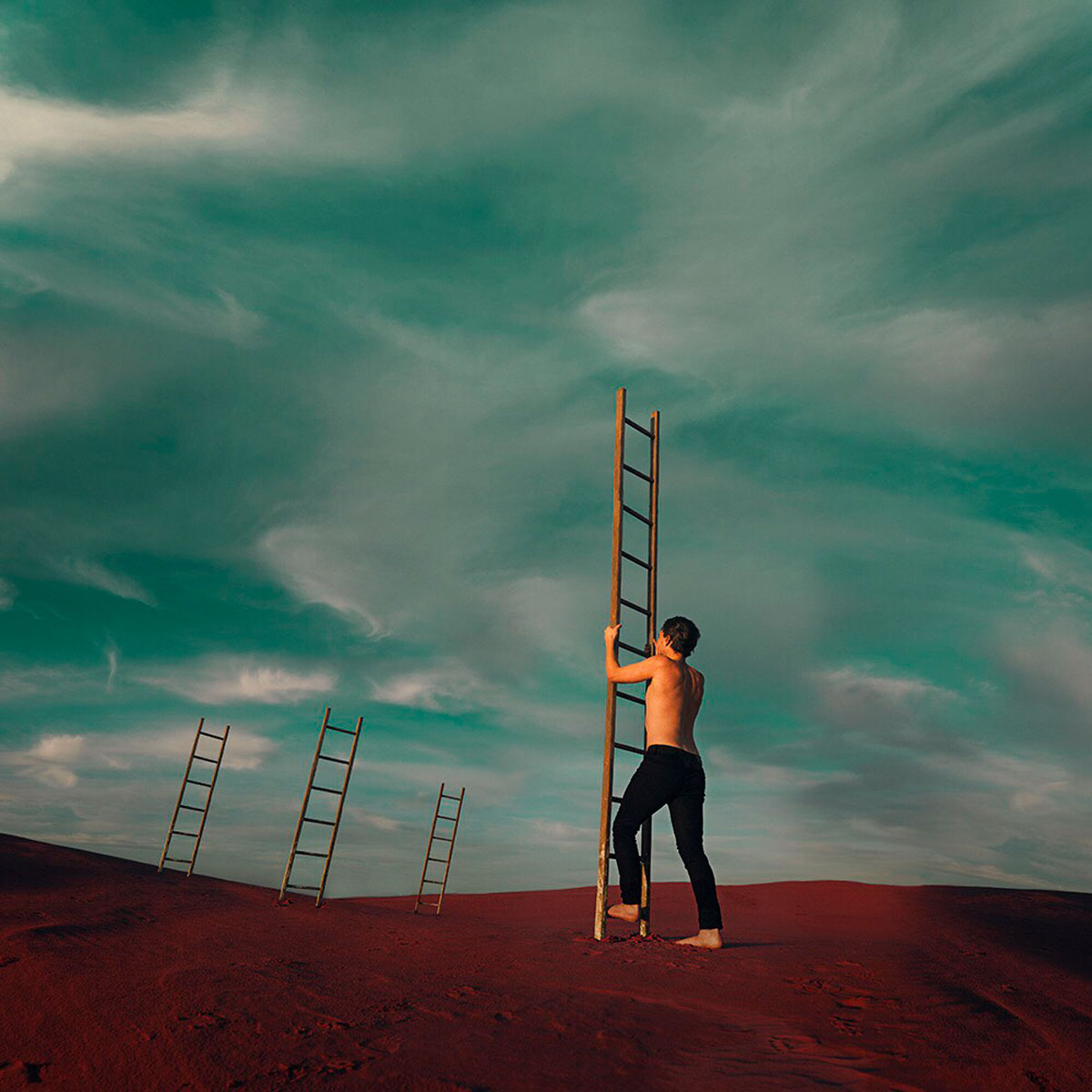 Nathan Milner concept photography digital art image of man climbing ladder into clouds