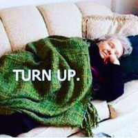 older woman lying on a couch sleeping with text that says 'turn up'