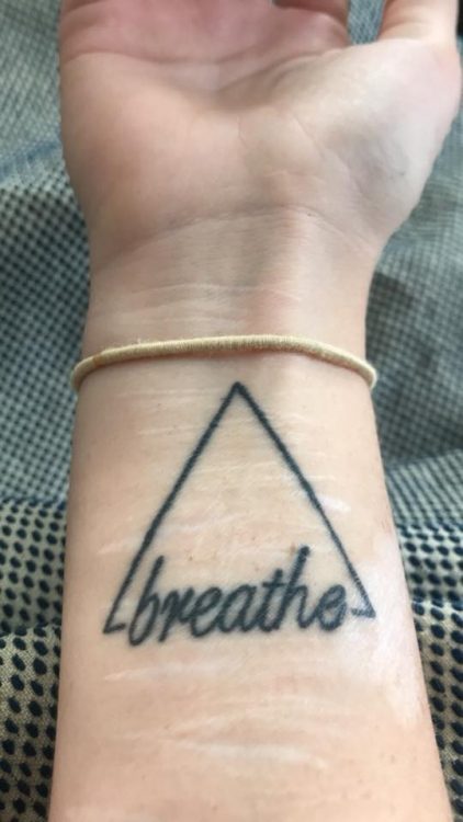 breathe triangle tattoo