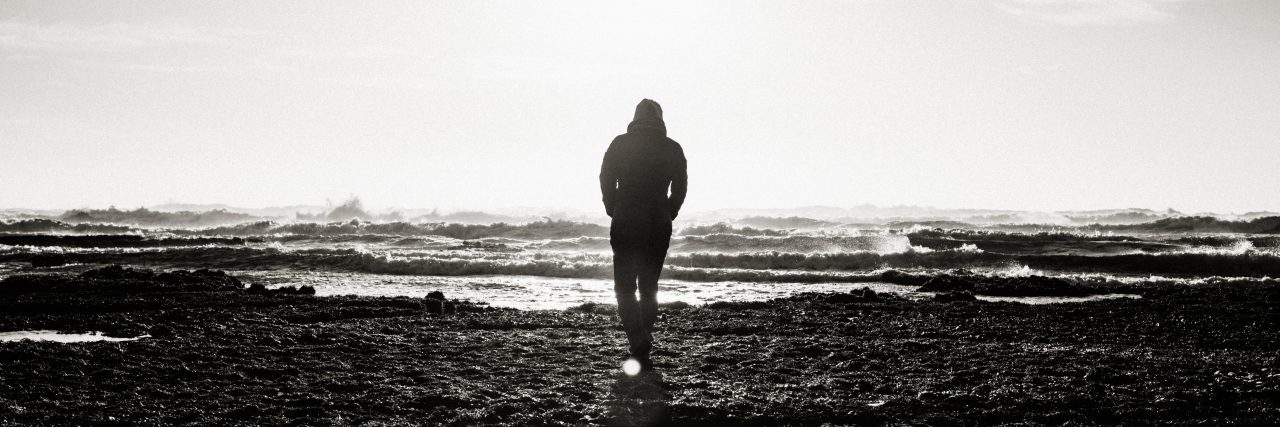 How to Get the Most Out of Veteran Health Care man at shore silhouetted against sky in black and white