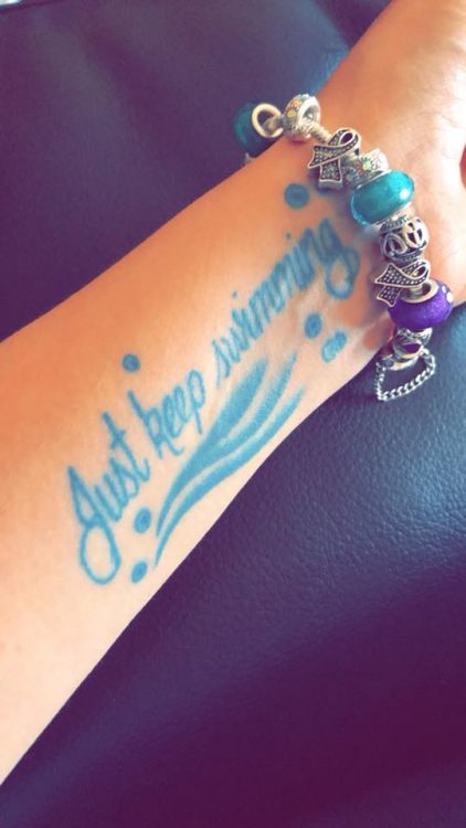 tattoo of "just keep swimming"