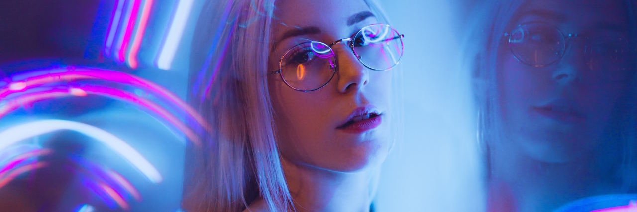 The 7 Types of Panic Attacks I Experience woman neon lights
