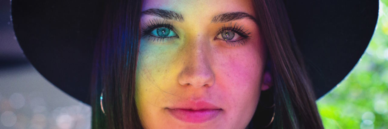 People Think I'm a 'High- Functioning' Person With Mental Illness woman with hat