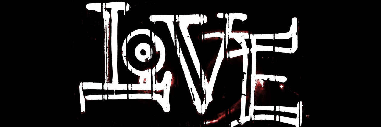 Keeping Love Alive in Life With (or Without) a Disability Stylized woodcut image of the word "love."